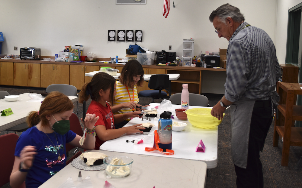 Mr. Joe Answers Students' Questions During Beginning Cake Decorating At Catalina Foothills Summer Camps. Photo By Lisa Irish/ AZEdNews
