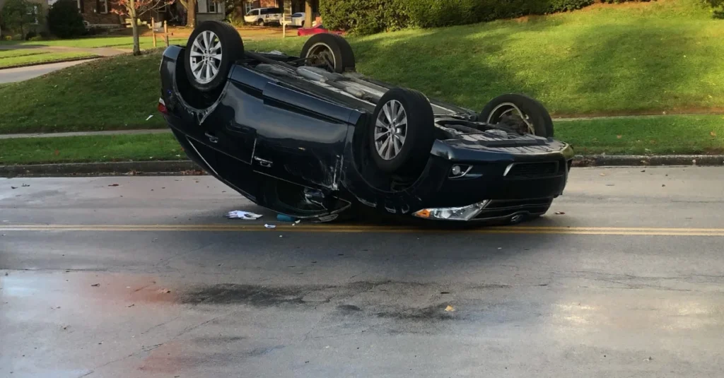 Lexington road closed after car flips to its side in crash