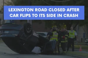 Lexington road closed after car flips to its side in crash